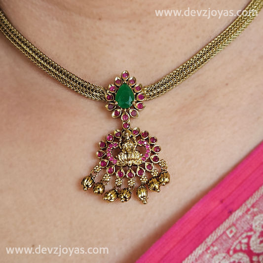 Attigei ruby and green stone