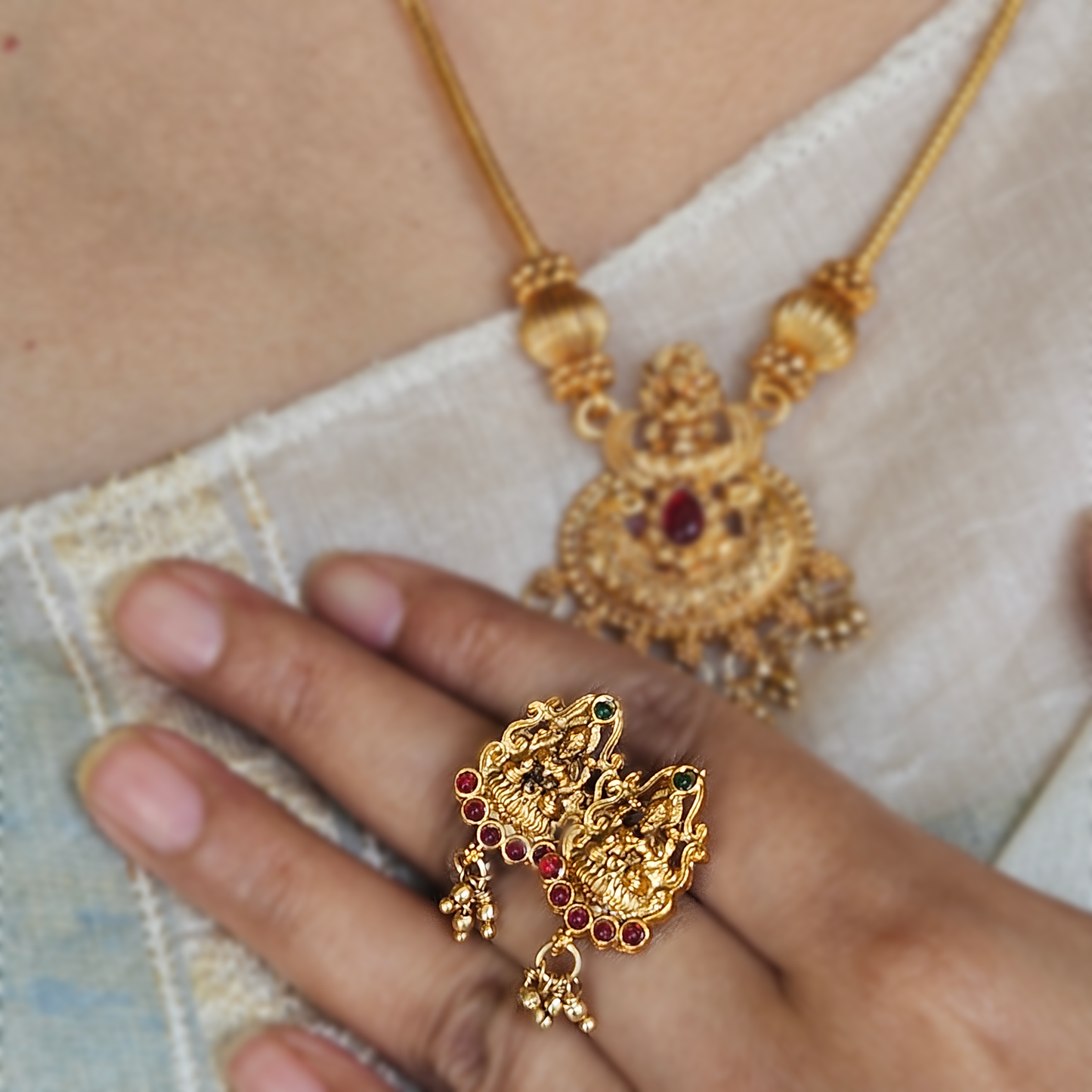 Long chain with Lakshmi pendant