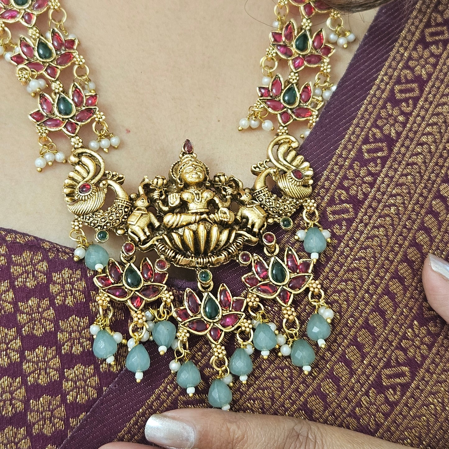 Long haram lotus Lakshmi with sea green drops