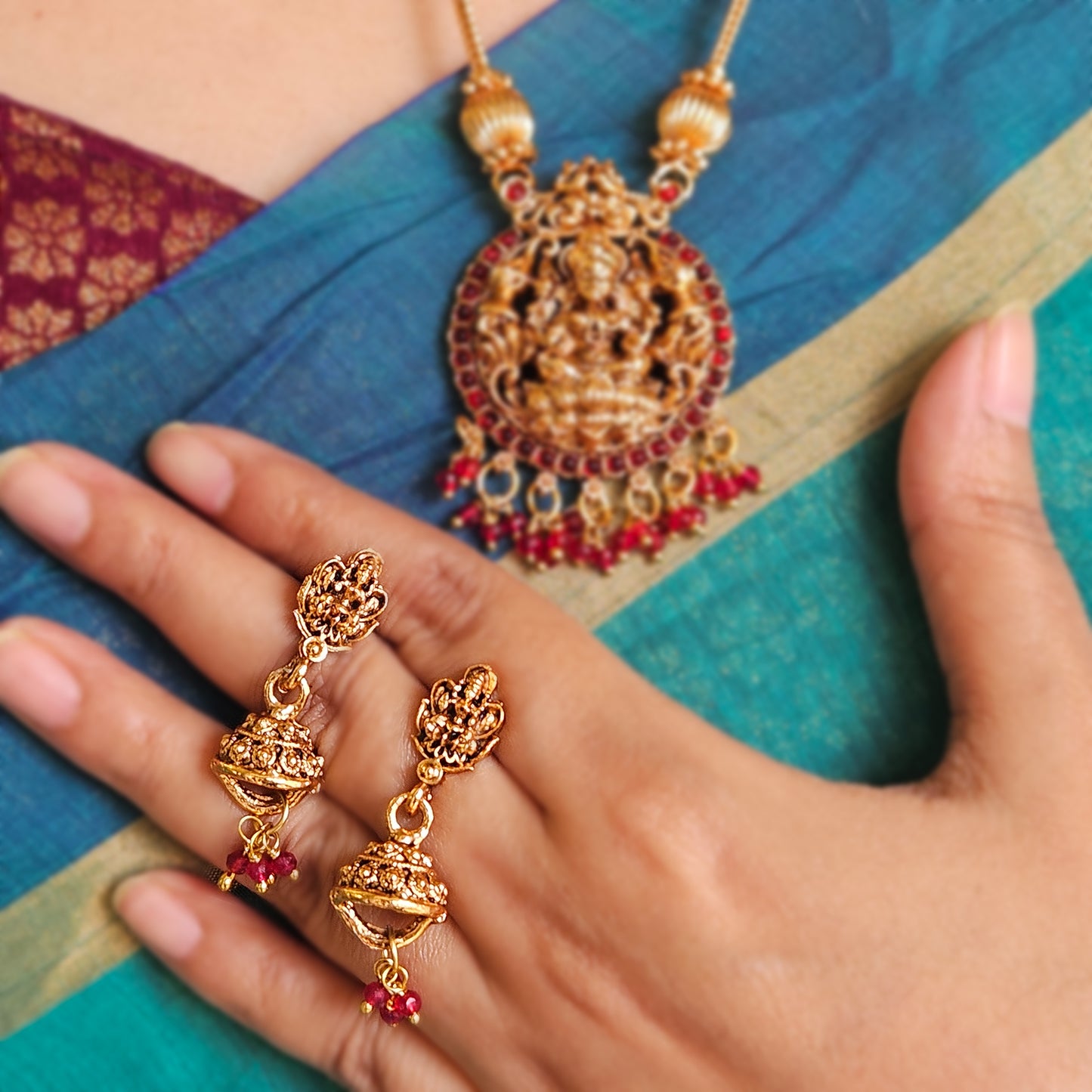 Long Lakshmi pendant with red drops