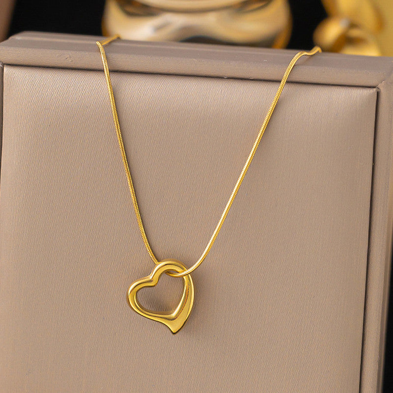 Stainless steel anti tarnish golden chain with heart shaped pendant - hollow