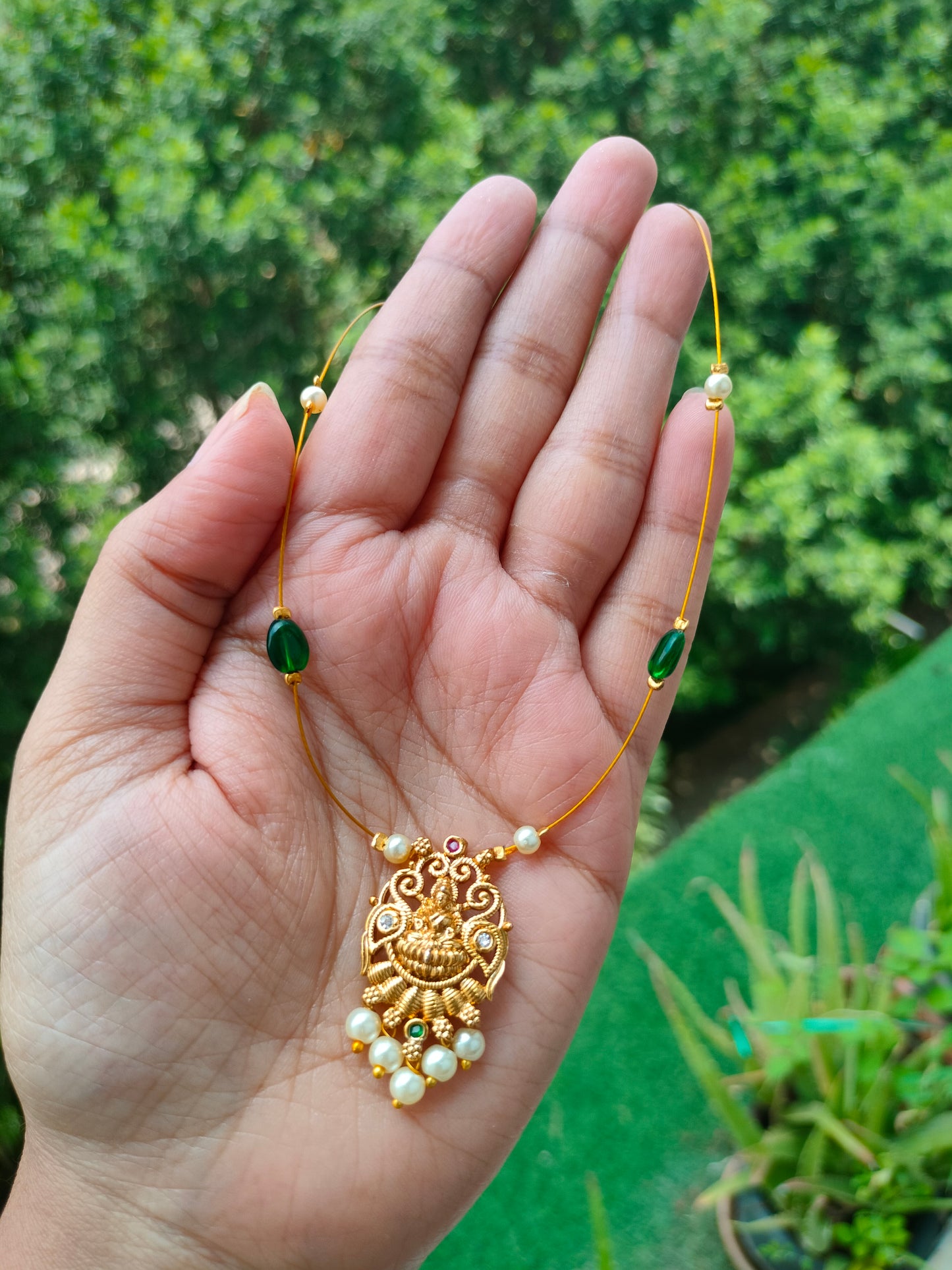 Invisible chain with Lakshmi pendant