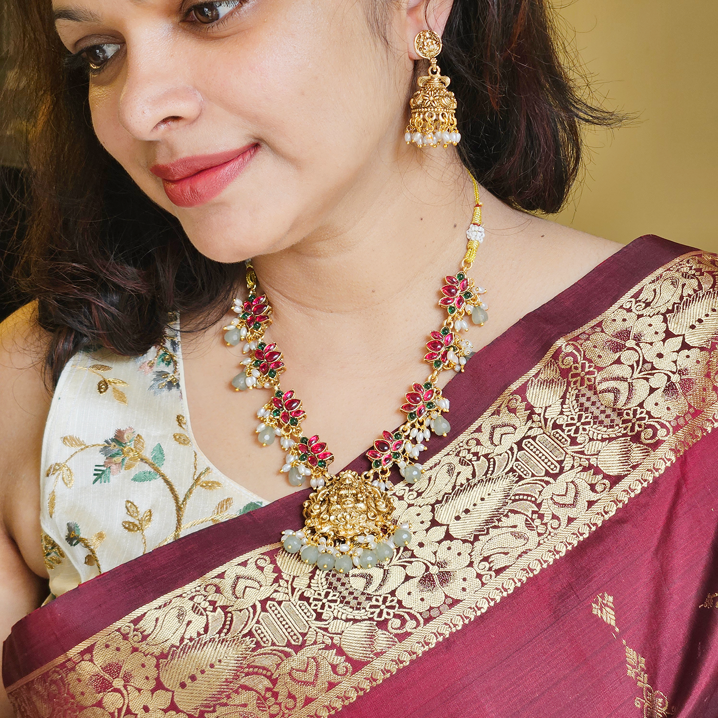 Guttapusalu - lotus with jhumkas