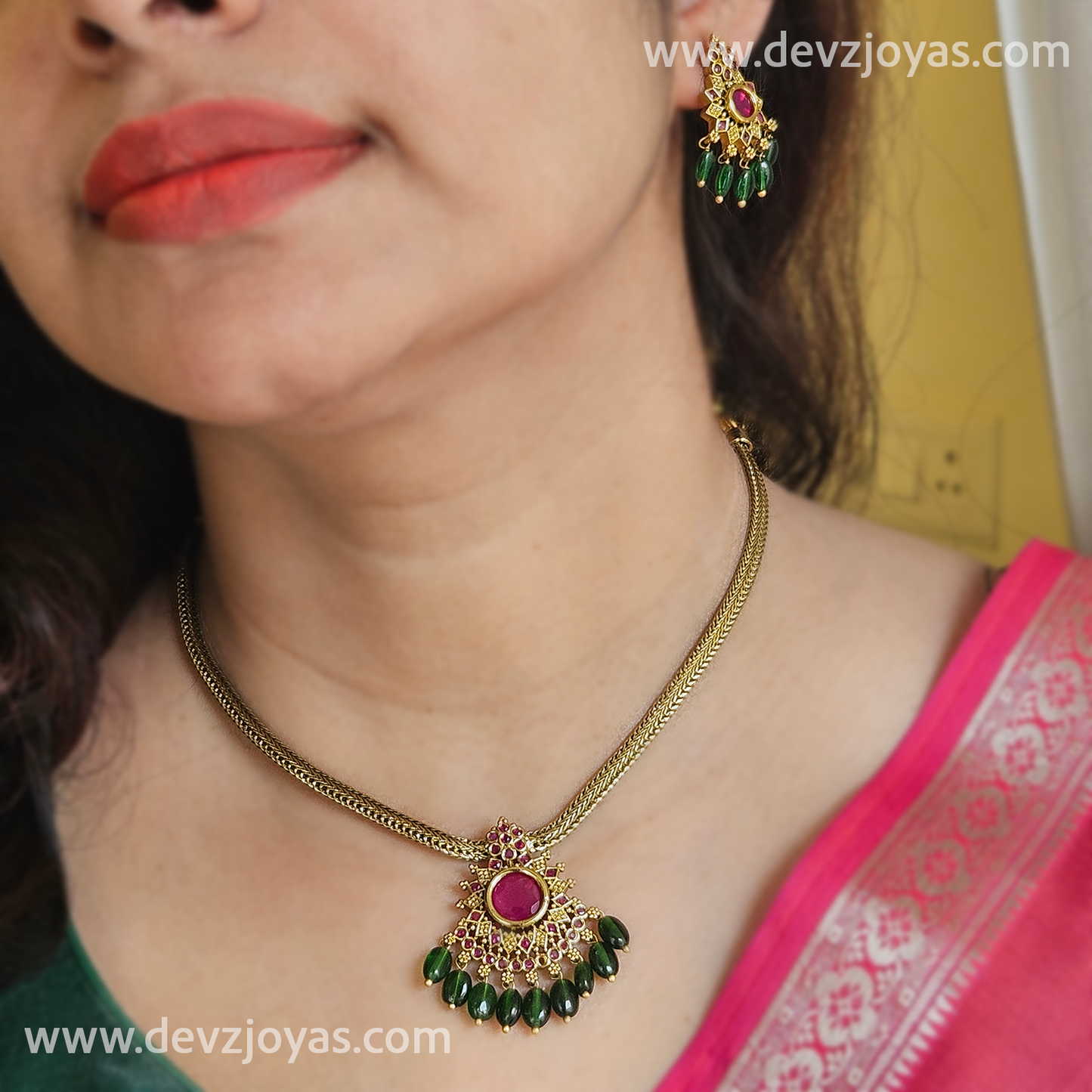 Atigei ruby stone pendant with green drops