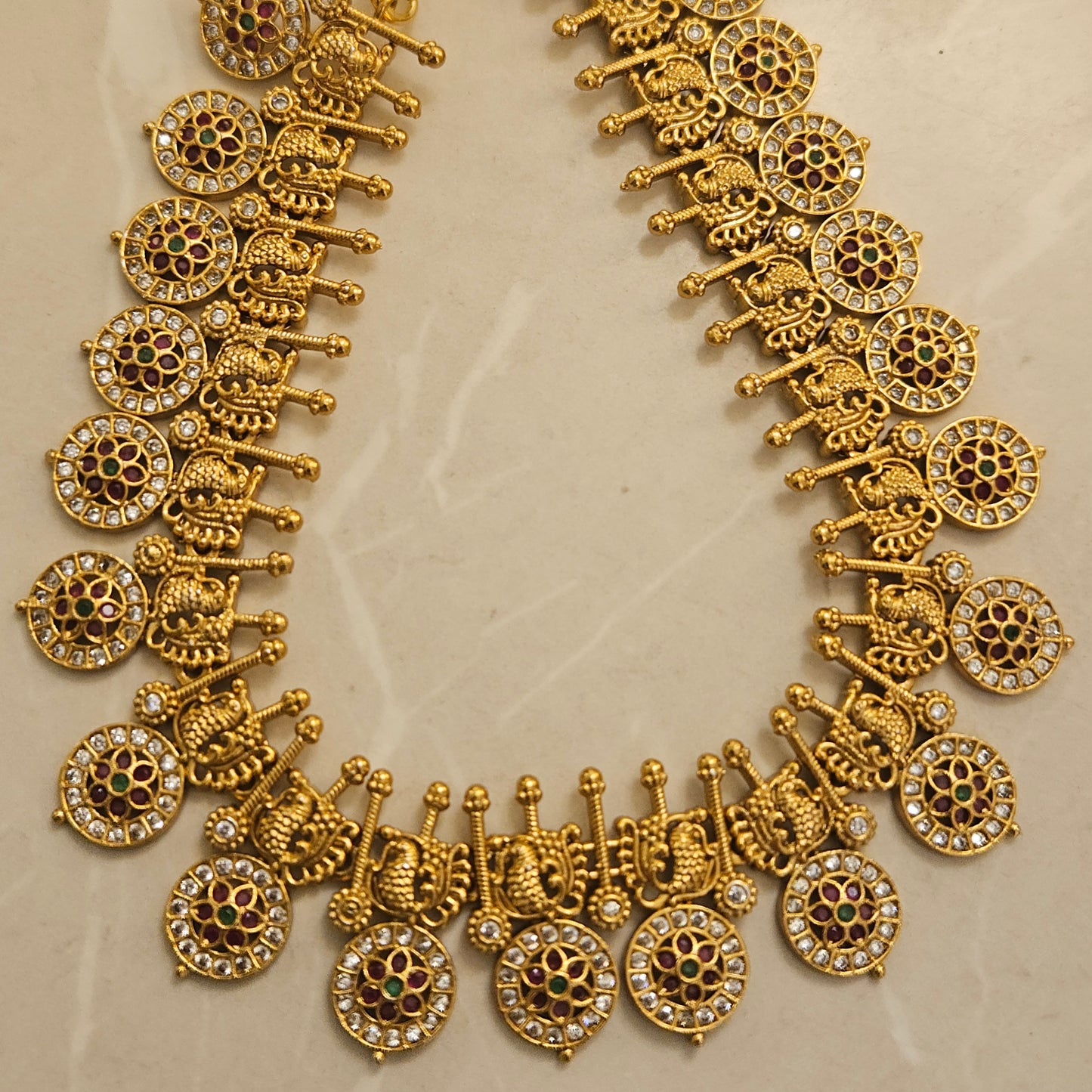 Traditional golden suvarna mayuri necklace set