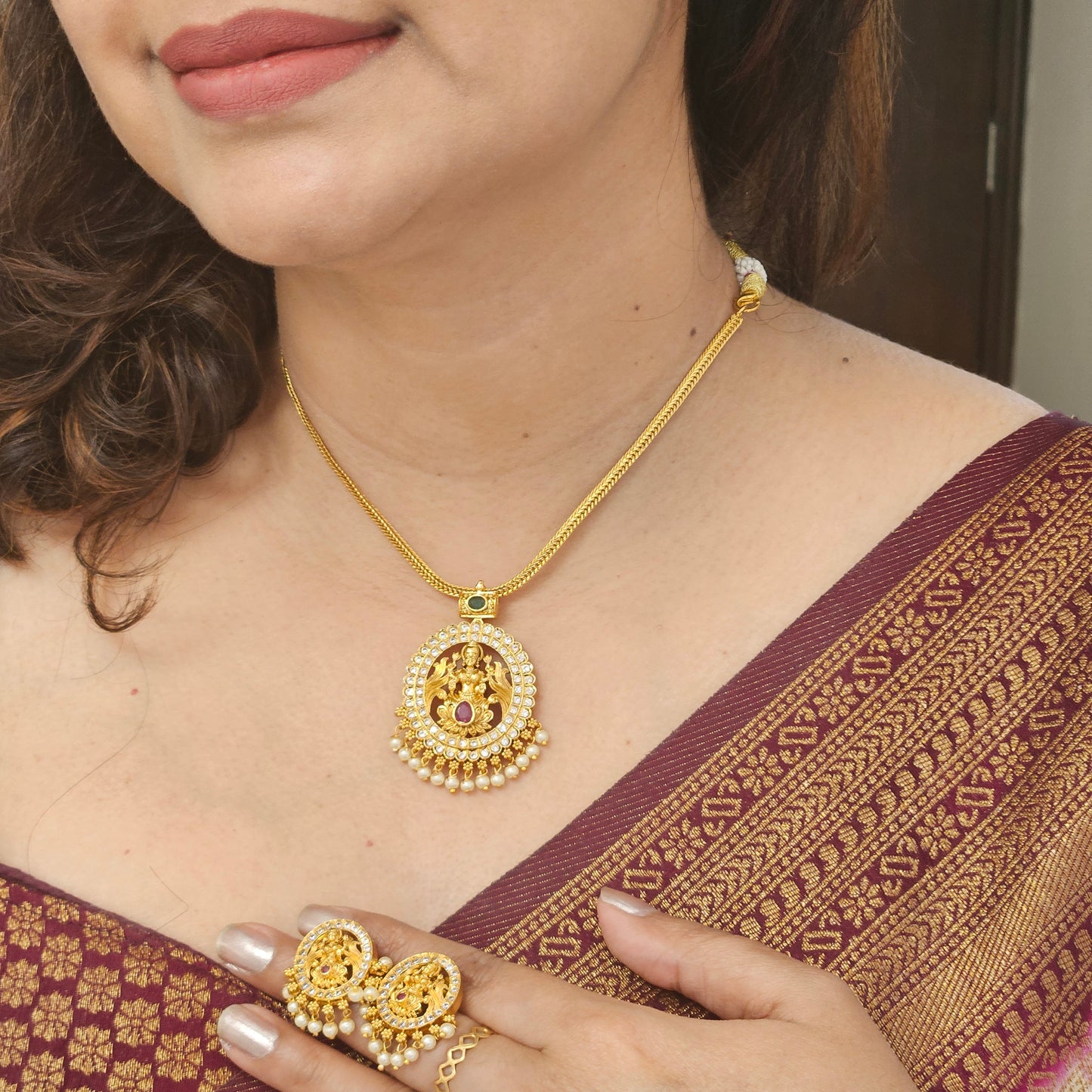 Attige Lakshmi pendant with AD stones and earrings