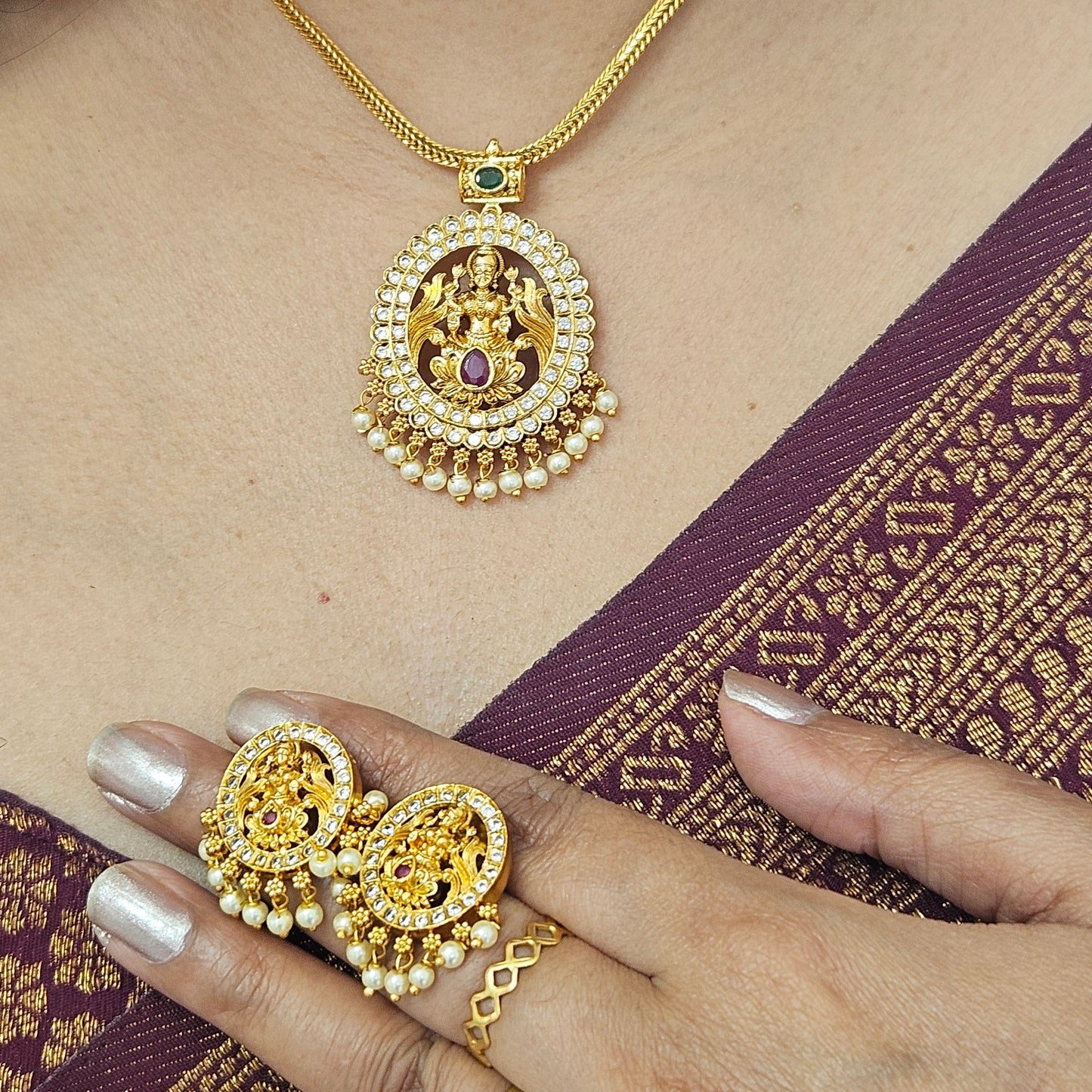 Attige Lakshmi pendant with AD stones and earrings