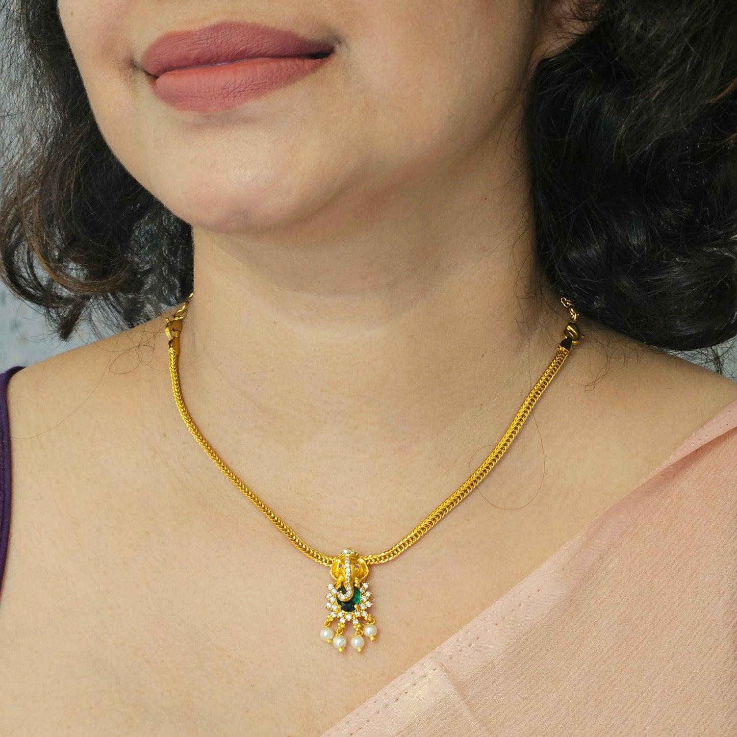 Attige Vinayaka with fish hook back chain and earrings