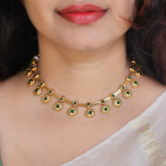 Necklace coin with green stones and studs