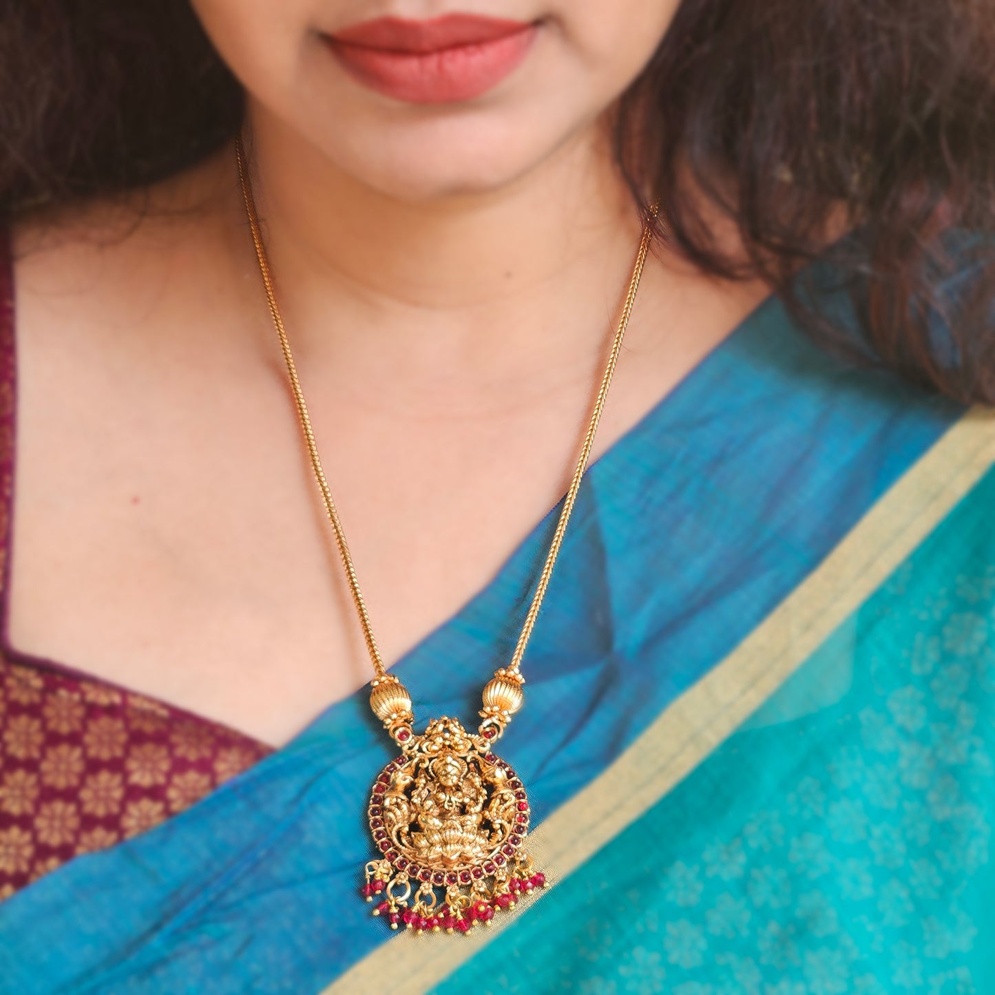Long Lakshmi pendant with red drops