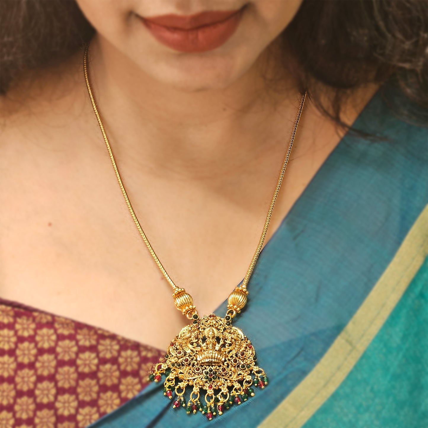 Long Lakshmi pendant green and red drops