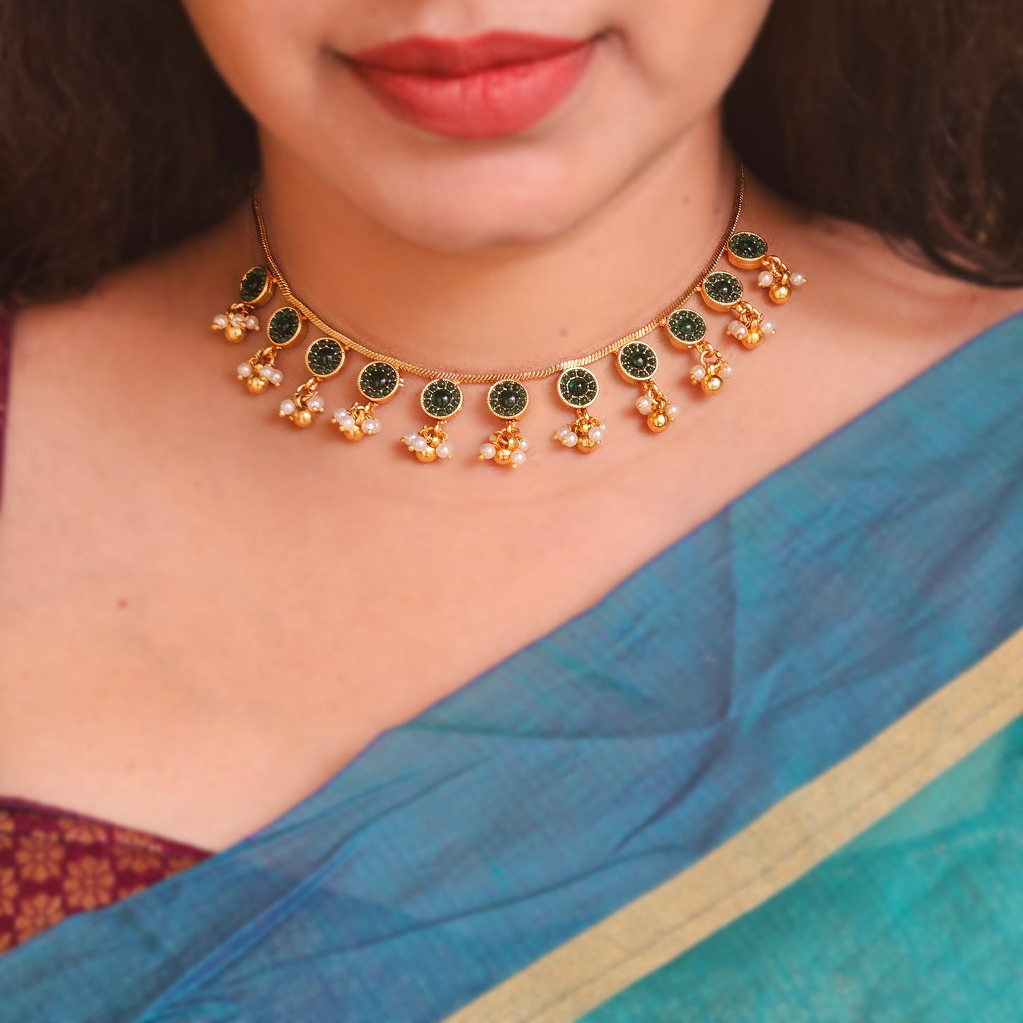 Multi pendant necklace with green stone and pearl drops