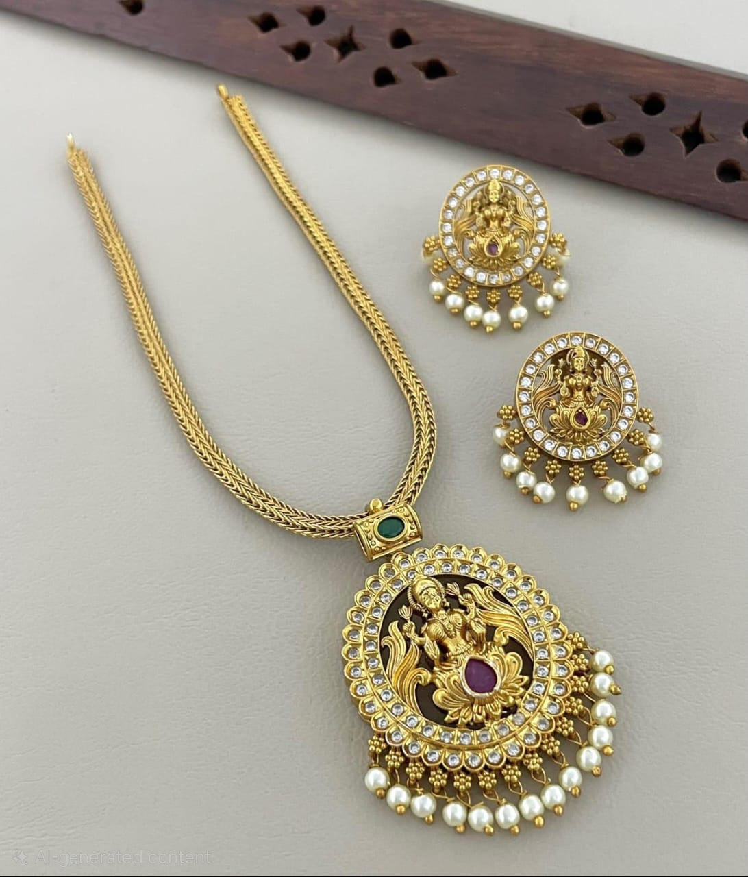 Attige Lakshmi pendant with AD stones and earrings