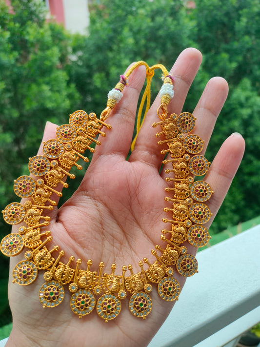 Traditional golden suvarna mayuri necklace set