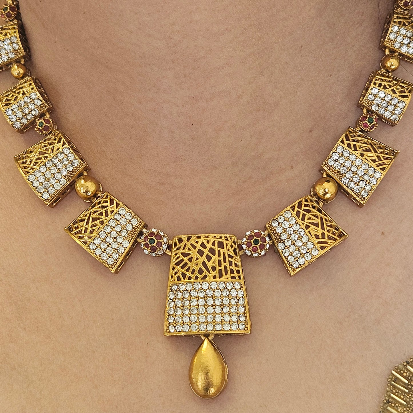 Golden necklace with White AD Stones