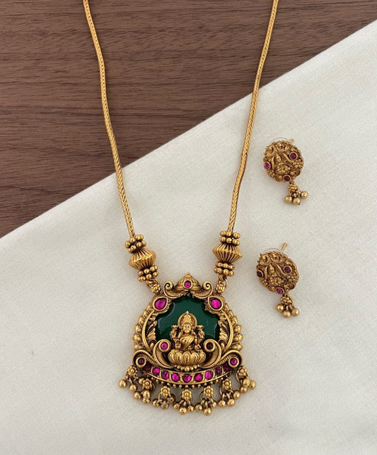 Short haram lakshmi pendant in green with ruby stones
