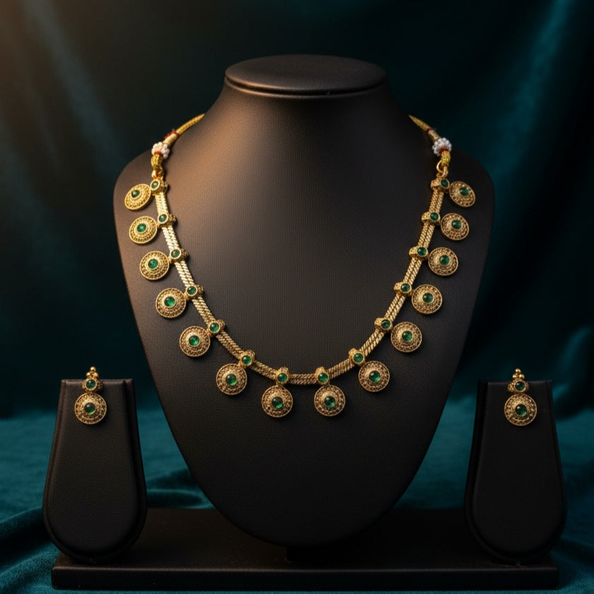 Necklace coin with green stones and studs