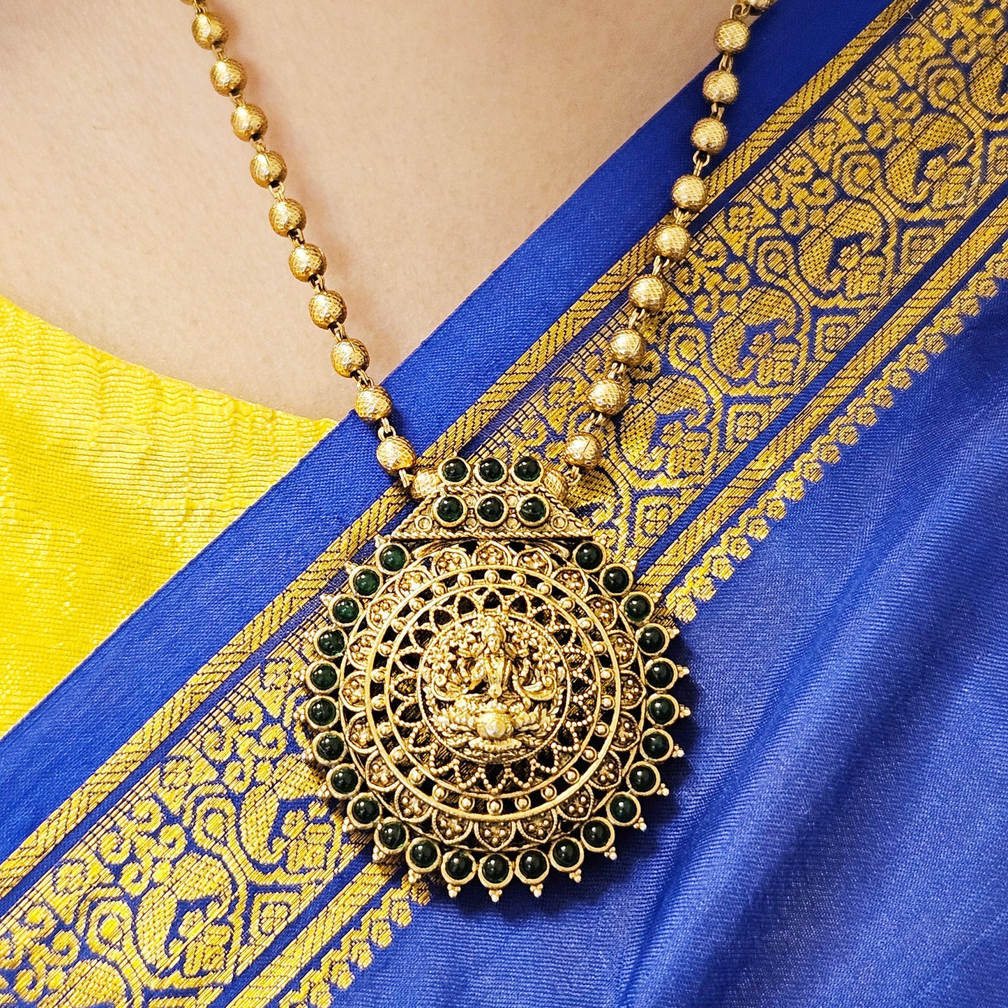 Short haram Golden beads -Lakshmi Pendant Green