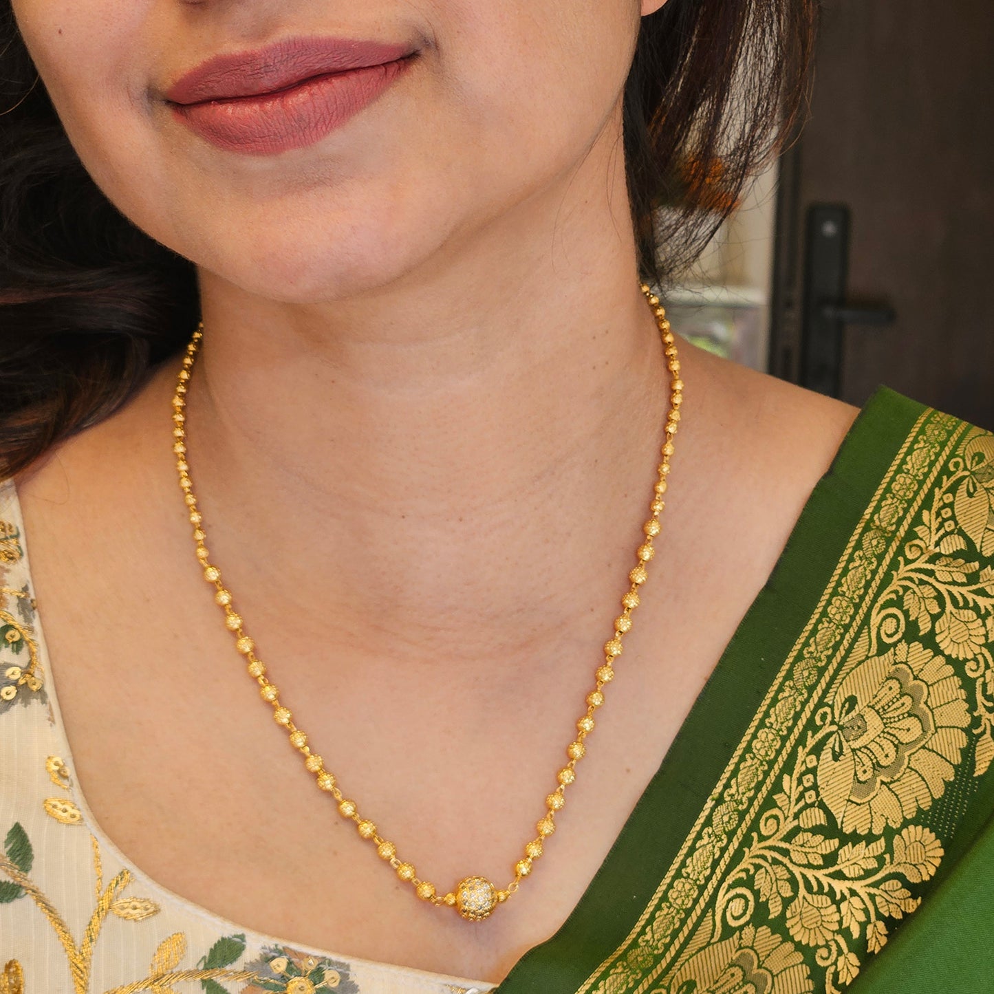 Golden Ball necklace - Guarantee